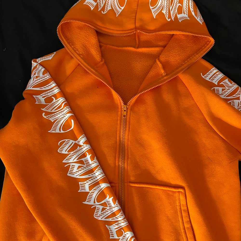 Full zip up Orange Hoodie with White Graphic Design